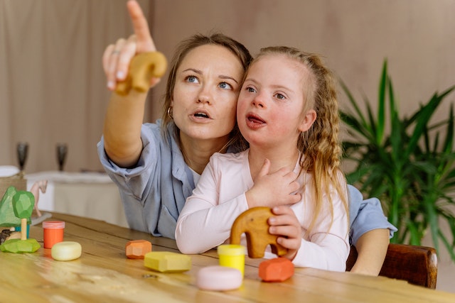 https://www.pexels.com/photo/a-woman-and-young-girl-looking-up-together-6288116/