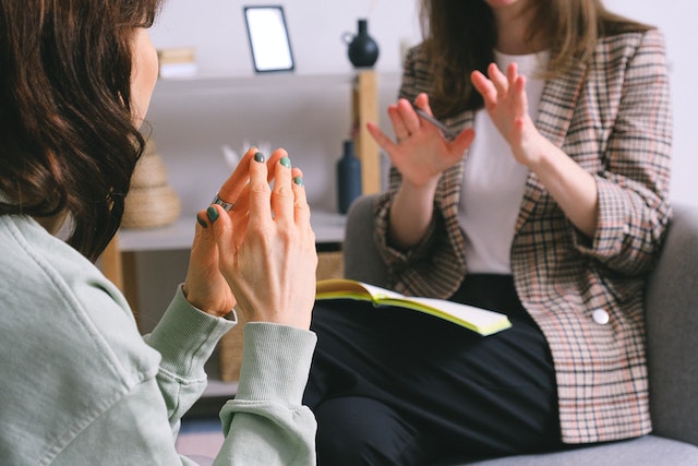 https://www.pexels.com/photo/crop-unrecognizable-female-psychologist-and-patient-discussing-mental-problems-during-session-7176319/